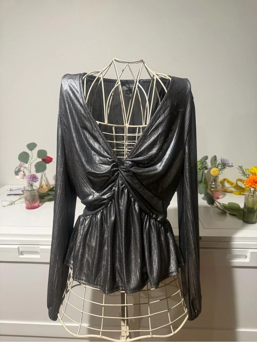 BOLD elements Shimmery Black Twist-Front Peplum Blouse